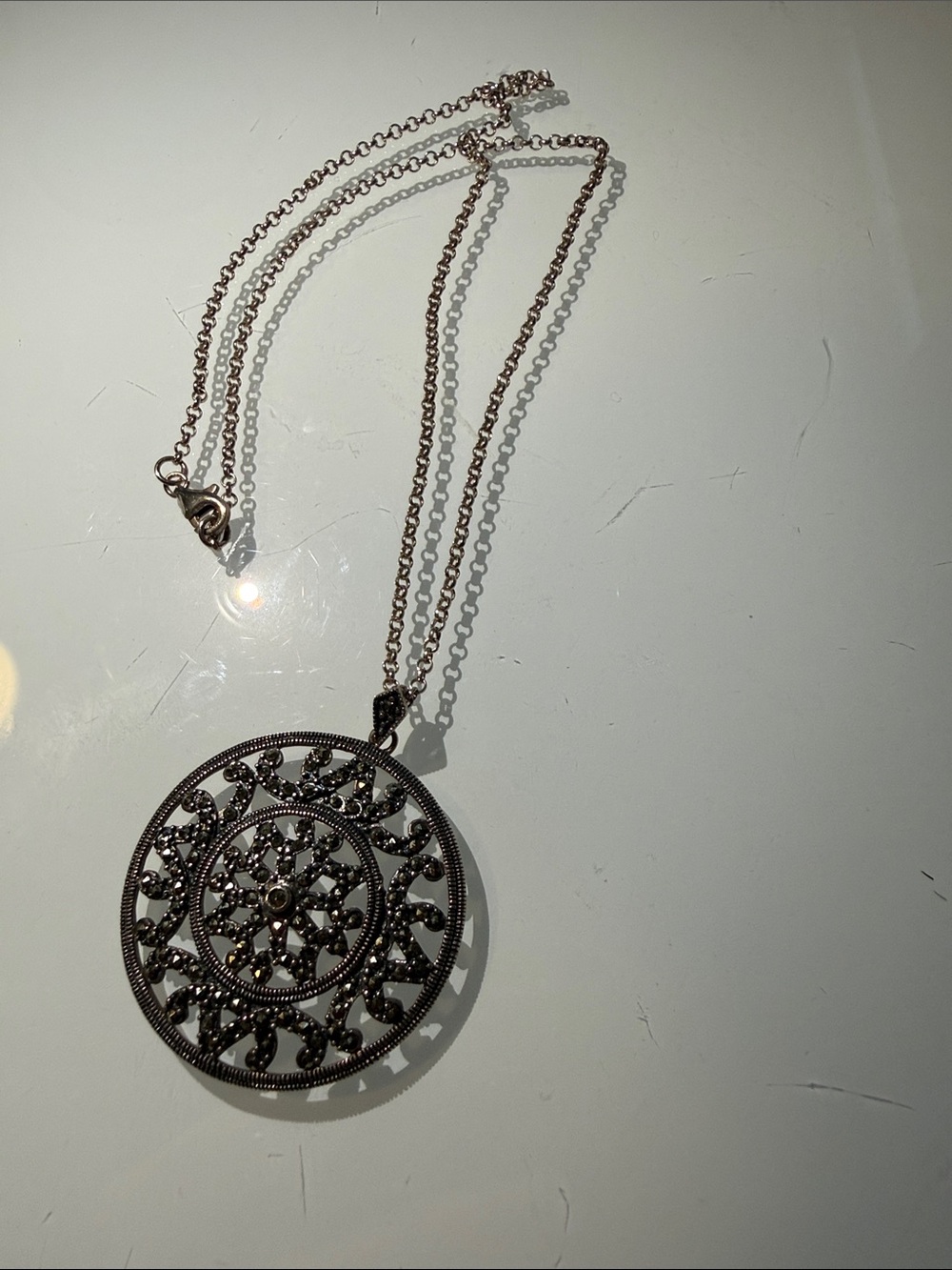 Stanley Gunmetal Round Filigree Pendant Necklace with Dark Accents